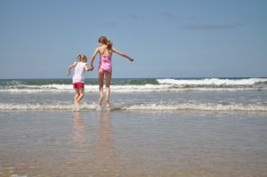 Day 84: Wave jumping at Crooklets Beach - introducing the memories of my childhood summer holidays to my girls