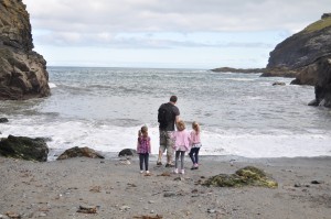 Day 174: A visit to Tintagel. Exploring Merlin's Cave, skipping stones into the sea, the smell of the ocean, the spectacular views and pride at my girl for climbing all the way to the top to see the castle ruins.