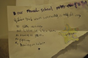 Day 324: On the saddest of days I found this sign taped to the stair bannisters after a game of 'Schools'. It reads "Our school rules: Quiet when somebody is talking; no running; ut litter in the bin; no drawing on faces(!); no fighting; no drawing on tables; behave". Proof that even in the midst of darkness, there is always, ALWAYS a tiny bit of light.