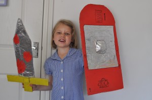 Day 474: Ella with her home-made Roman sword and shield for a school project. I only helped her with a couple of bits (double-sided tape can be really tricky for little fingers!) and she's really proud of all her hard work.