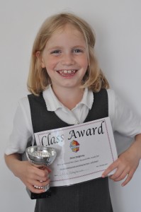 Day 471: Mimi got the Class Award this week! After months of feeling despondent because she hadn't received it, even though she's been trying really hard at school, she honestly believed that she would never get it because "I'm rubbish at EVERYTHING Mummy!". We had torrents of tears about it just this morning. And then she came out of school this afternoon clutching the trophy and hr certificate and I could have cried with happiness for her! She was so proud of herself :)