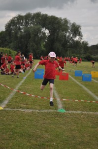 Day 477: Sports Day. Ella didn't participate last year - she flat out refused. This year she has been super-excited about it for weeks, and actually won two of her races! All three girls tried their best, cheered on their teammates and really enjoyed themselves.
