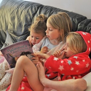 Day 512: I popped to Tesco at 7am and left one husband and three girls sleeping. When I returned half an hour later, I found Ella reading a story to her younger sisters (while my husband was still fast asleep upstairs!)